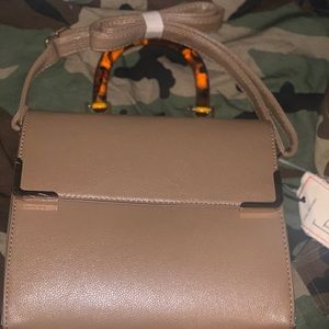 Cute small hand bag !! With cross body strap